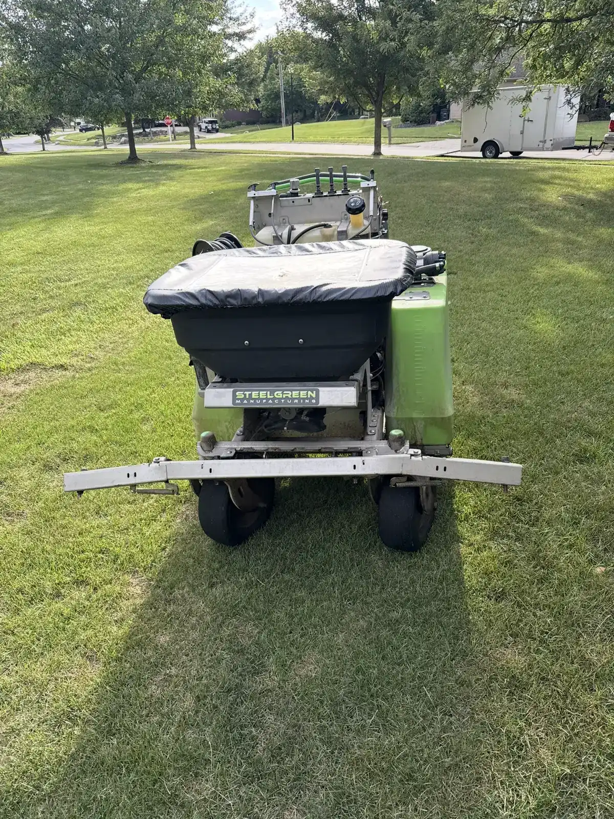 SteelGreen professional spreader used by Field of Dreams Lawn Care for precise fertilizer application